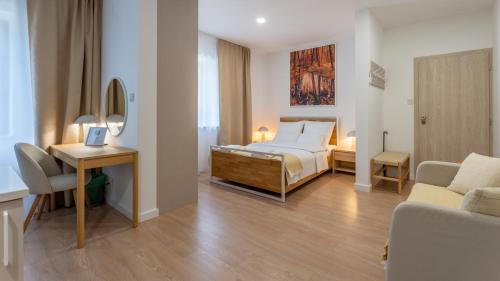 Ένα ή περισσότερα κρεβάτια σε δωμάτιο στο Apartamenty Zamojska