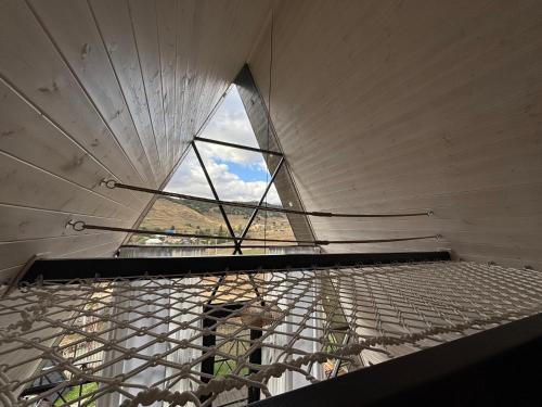 a view from the inside of a room with a window at Space Trip Hotel in Artavaz