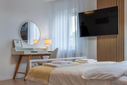 Μια τηλεόραση ή/και κέντρο ψυχαγωγίας στο Apartamenty Zamojska