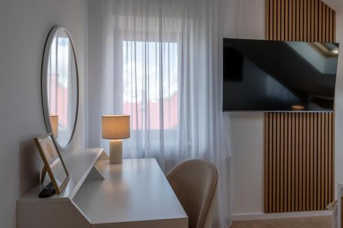 Μια τηλεόραση ή/και κέντρο ψυχαγωγίας στο Apartamenty Zamojska