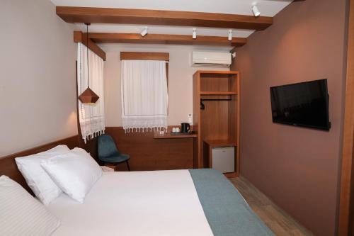 TV/Unterhaltungsangebot in der Unterkunft Palorto Hotel