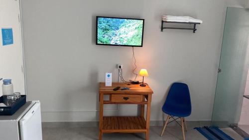 TV a/nebo společenská místnost v ubytování Coliving Bem Estar