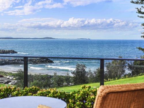 a view of the ocean from a balcony at ibis Styles Port Macquarie in Port Macquarie