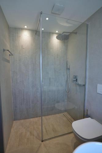Ein Badezimmer in der Unterkunft Palorto Hotel