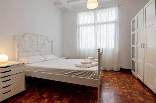 En eller flere senge i et værelse på Alojamiento acogedor