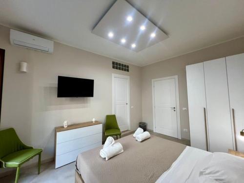 Uma cama ou camas num quarto em Athenèa Smart Rooms - Atenea Collection