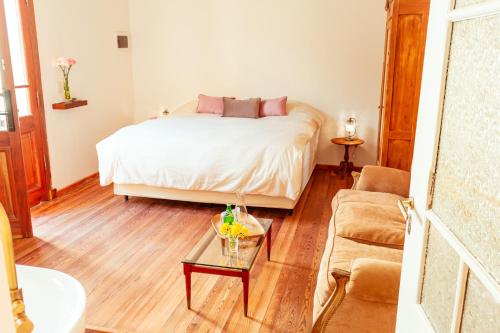Ένα ή περισσότερα κρεβάτια σε δωμάτιο στο La Noire Petit hotel