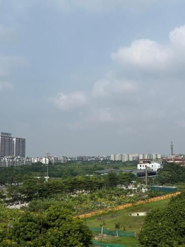 a view of a city with trees and buildings at Amber Mono in Hanoi