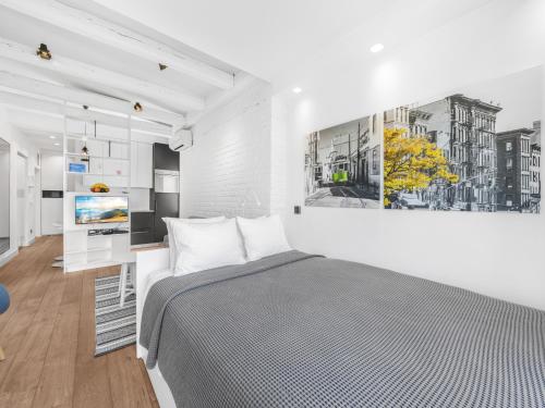 Ένα ή περισσότερα κρεβάτια σε δωμάτιο στο Enjoy B-52 Studio