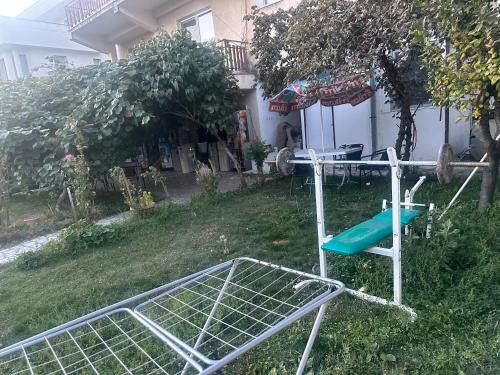 a frisbee hoop in the yard of a house at Rooms Struga in Struga
