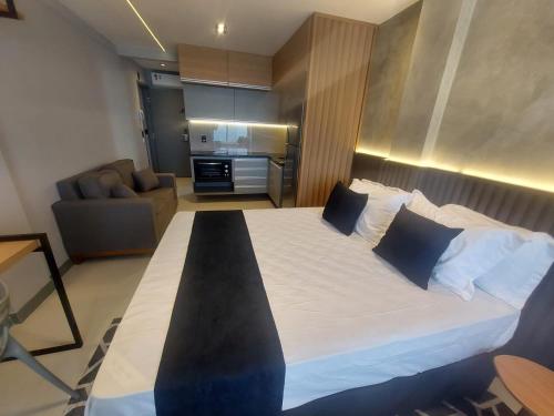 Un ou plusieurs lits dans un hébergement de l'établissement V-Home Flat Hotel