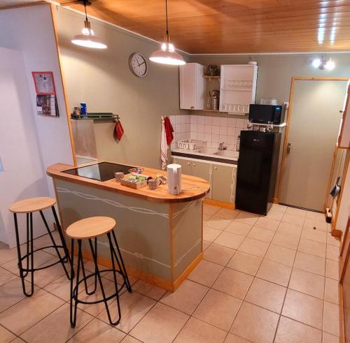Kuchyň nebo kuchyňský kout v ubytování Appart-hôtel original facile d'accès
