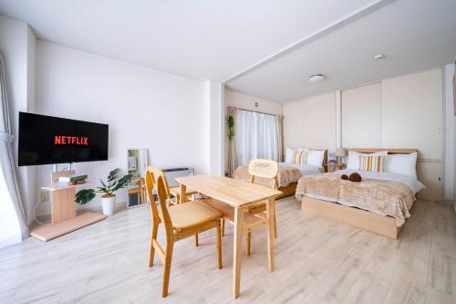 Den SUSUKINO ROOMS