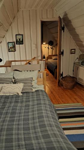a bedroom with two beds in a room at Wieża marzeń in Dąbrowa Grodzieńska-Wieś