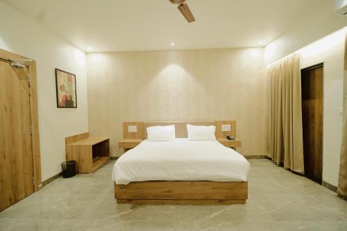 Postel nebo postele na pokoji v ubytování the Vibez Inn Hotel