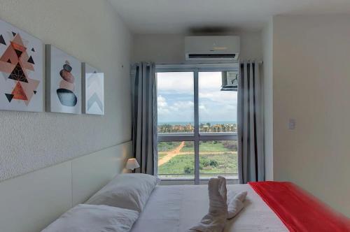 Postel nebo postele na pokoji v ubytování Beach Townhouses #C8 - Conforto por Carpediem