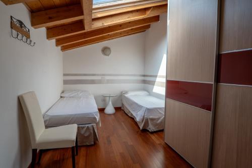 Postel nebo postele na pokoji v ubytování B&B Corte Barbieri