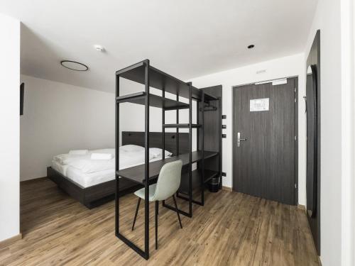 Smarthotel brenner24にあるベッド