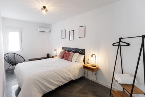 Postel nebo postele na pokoji v ubytování Natysplace