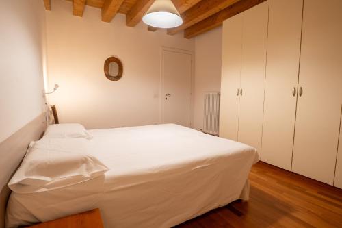 Postel nebo postele na pokoji v ubytování B&B Corte Barbieri