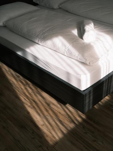 Smarthotel brenner24にあるベッド