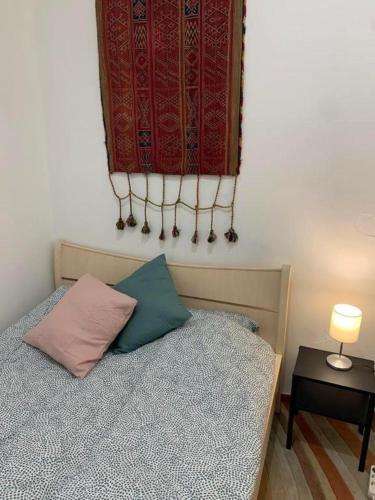 Ένα ή περισσότερα κρεβάτια σε δωμάτιο στο Stadium Rooms