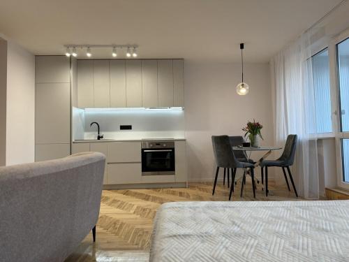 Η κουζίνα ή μικρή κουζίνα στο Cozy Apartment Near Forest