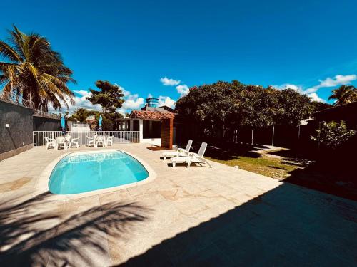 Bazén v ubytování Casa em bairro nobre de Prado nebo v jeho okolí