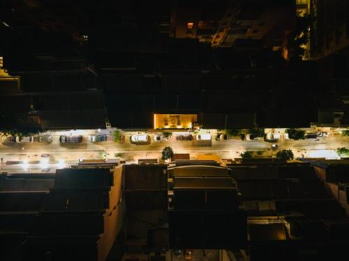 an aerial view of a parking lot at night at Luxury 2BR Apartment near the marina, Heart of Piraeus in Piraeus