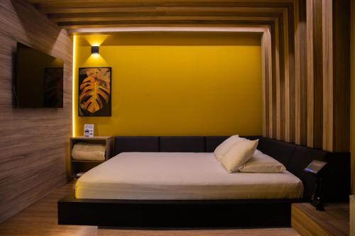 Ένα ή περισσότερα κρεβάτια σε δωμάτιο στο Motel Chavelle