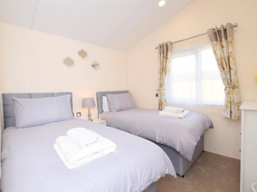 Ένα ή περισσότερα κρεβάτια σε δωμάτιο στο 2 Bed in Sidmouth 76515