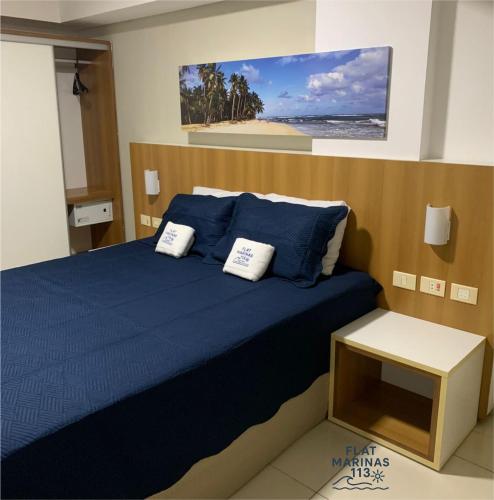 Ένα ή περισσότερα κρεβάτια σε δωμάτιο στο Flat 113 - Marinas Praia Flat