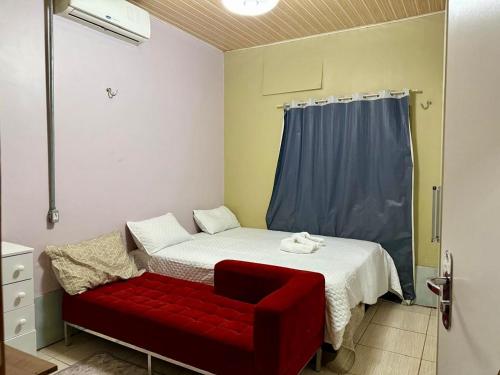เตียงในห้องที่ Lar Bernardes COP 30