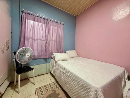 เตียงในห้องที่ Lar Bernardes COP 30
