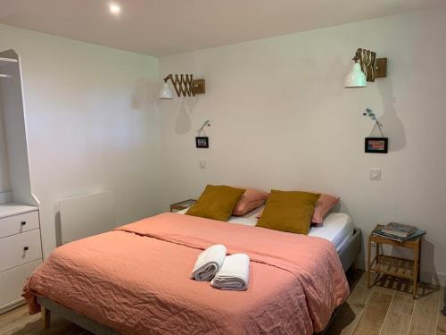 Postel nebo postele na pokoji v ubytování Logement T2 et Véritable écrin de verdure en ville