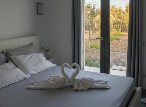 Postel nebo postele na pokoji v ubytování Villa Cristina Menfi