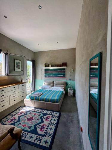 Ένα ή περισσότερα κρεβάτια σε δωμάτιο στο Le Palombelle Casa Vacanze