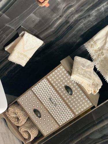a bathroom with two sinks in a box at Casa del sole in Nova Siri Marina