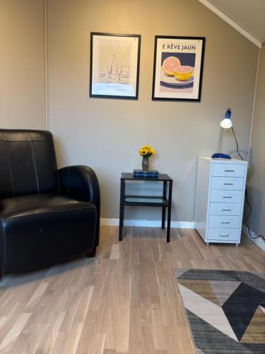 Ruang duduk di Komfort og stil-perfekt for ferie og jobb
