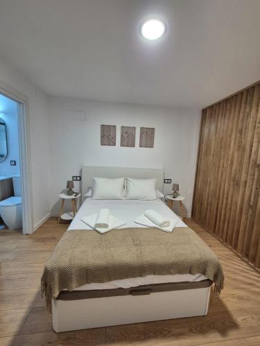 Katil atau katil-katil dalam bilik di Apartamento concepción