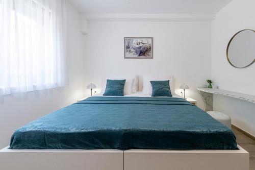 Ένα ή περισσότερα κρεβάτια σε δωμάτιο στο Tila Luxury Suite