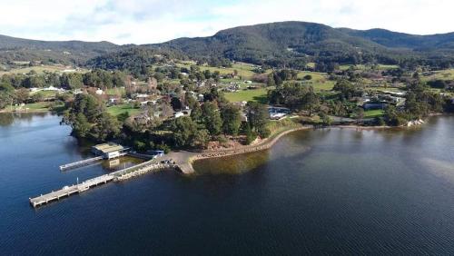 an aerial view of a small island in a lake at D'entre Cabin in Woodbridge