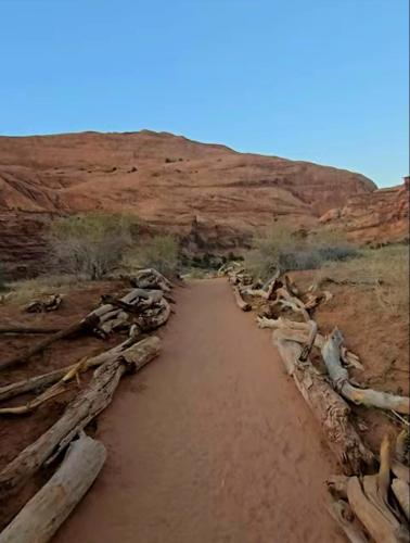 a dirt road in the middle of a desert at Moab Rim Cabin #16 in Moab