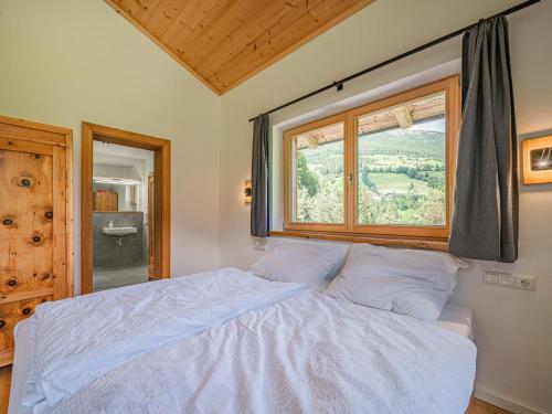 Ένα ή περισσότερα κρεβάτια σε δωμάτιο στο Haus Bergstille Top 3