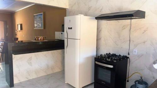 Casa Raio de Luzにあるキッチンまたは簡易キッチン