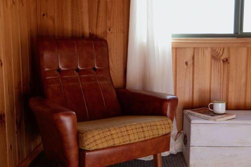 Posezení v ubytování Panorama Cabin - A