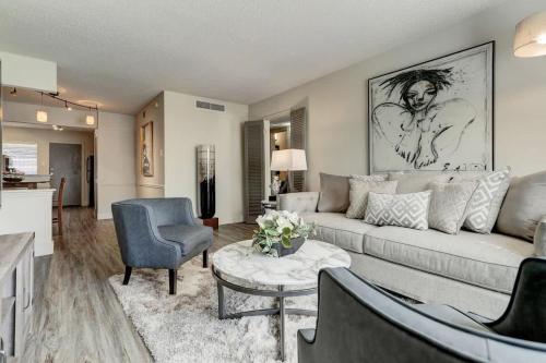 a living room with a couch and a table at Perfect Perk Marquee Uptown Unit 121 Galleria 2br 2ba in Houston