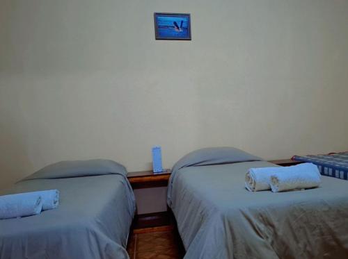 Postel nebo postele na pokoji v ubytování El Amanecer