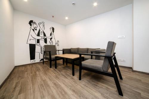 Et opholdsområde på Hotel O Elite