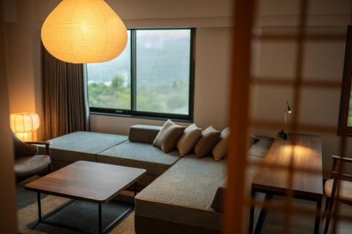 Ein Bett oder Betten in einem Zimmer der Unterkunft The Pulse Kirishima- Opening in 16th Aug 2025